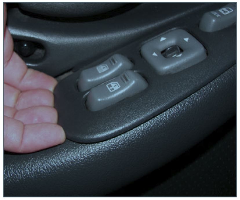 Remove the window/lock switch by lifting up