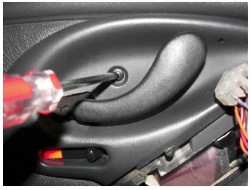 Remove the lever cover screw